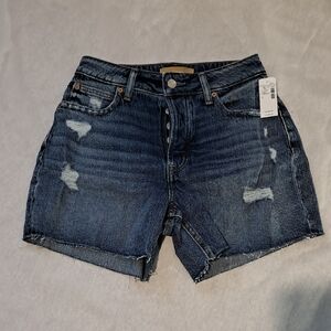 Maurices Distressed Curvy High Rise. 5 inch‎ Cheeky Short. Size 2. Medium Wash.